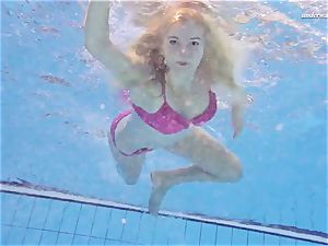 molten Elena displays what she can do under water